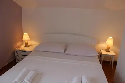 Krevet ili kreveti u jedinici u objektu Apartments Petrada