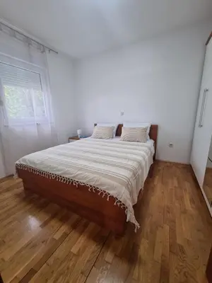 Krevet ili kreveti u jedinici u objektu Apartment Bella with free parking