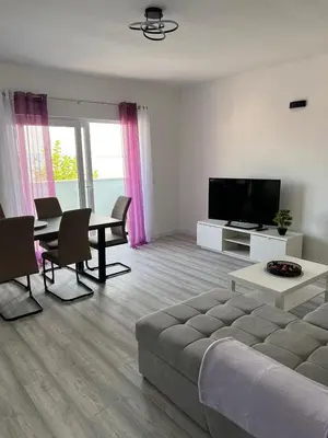 TV i/ili zabavni centar u objektu Apartment Lena