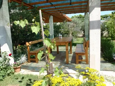 Vrt u objektu Apartment in Dugi Rat with sea view, balcony, air conditioning, WiFi 5132-6