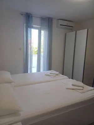Krevet ili kreveti u jedinici u objektu Apartman i soba Nina