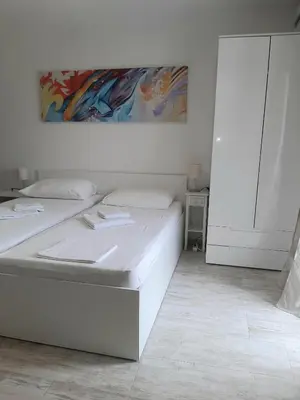 Krevet ili kreveti u jedinici u objektu Apartman i soba Nina