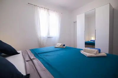 Krevet ili kreveti u jedinici u objektu Family Apartments Brach - Free Parking