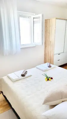 Krevet ili kreveti u jedinici u objektu Sunrise Podstrana
