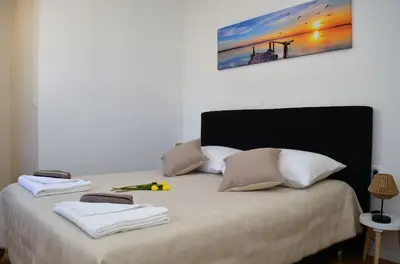 Krevet ili kreveti u jedinici u objektu Sunrise Podstrana