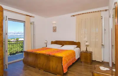 Krevet ili kreveti u jedinici u objektu Villa Lukrecia - Stone Villa with Pool & Sea Views I Supetar, Brač