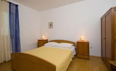 Krevet ili kreveti u jedinici u objektu Villa Lukrecia - Stone Villa with Pool & Sea Views I Supetar, Brač