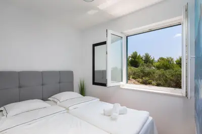 Krevet ili kreveti u jedinici u objektu Sunrise Apartment Hvar