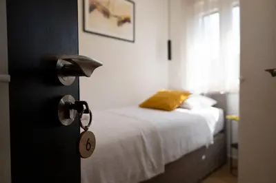 Krevet ili kreveti u jedinici u objektu Lučica, Luxury Rooms By the Sea