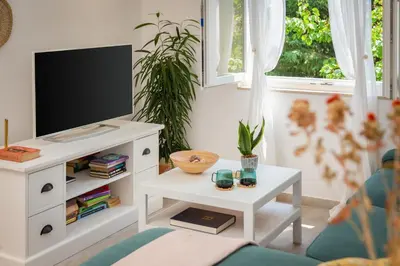 TV i/ili zabavni centar u objektu Holiday Home Dora