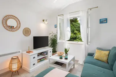 TV i/ili zabavni centar u objektu Holiday Home Dora