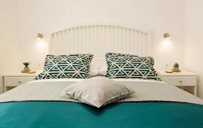 Krevet ili kreveti u jedinici u objektu Santa Cruz Apartments Supetar