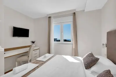 Krevet ili kreveti u jedinici u objektu Apartment Hrvoje -nur 50m bis zum Meer - Makarska Exklusiv