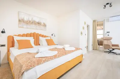 Krevet ili kreveti u jedinici u objektu Apartman Palma and Luxury Penthouse for a family with swiming pool,parking,terrace,panoramic view at the sea,Podstrana