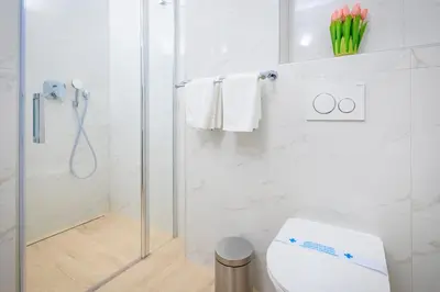 Kupaonica u objektu Apartman Palma and Luxury Penthouse for a family with swiming pool,parking,terrace,panoramic view at the sea,Podstrana