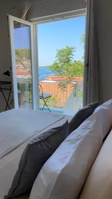 Krevet ili kreveti u jedinici u objektu Yukka ComFor city center Hvar apartment with parking
