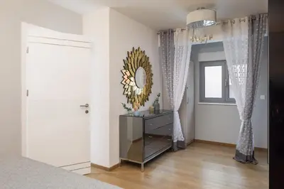 Krevet ili kreveti u jedinici u objektu Sara - Luxurious sea view apartment with garage