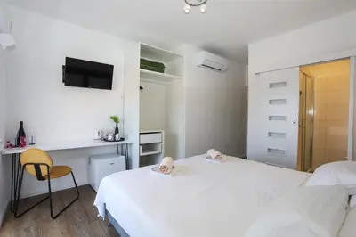 Krevet ili kreveti u jedinici u objektu Stella Maris Hvar - Sea View Rooms with Balcony