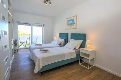 Krevet ili kreveti u jedinici u objektu Stella Maris Hvar - Sea View Rooms with Balcony
