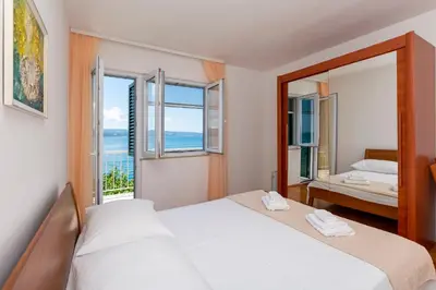 Krevet ili kreveti u jedinici u objektu Apartments Marino