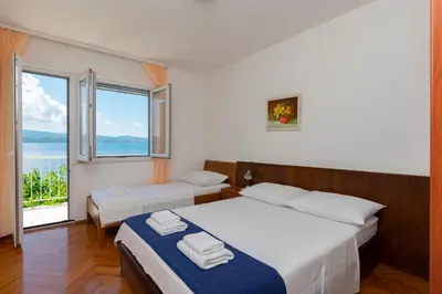 Krevet ili kreveti u jedinici u objektu Apartments Marino