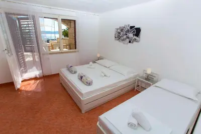 Krevet ili kreveti u jedinici u objektu Apartments and Rooms Hope