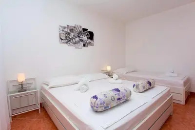 Krevet ili kreveti u jedinici u objektu Apartments and Rooms Hope