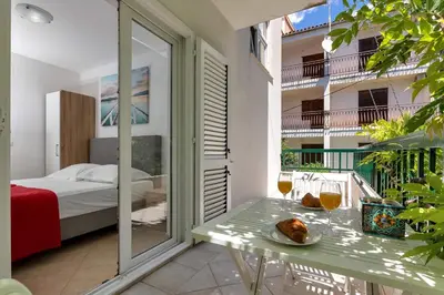 Krevet ili kreveti u jedinici u objektu Apartments Harmony of Five