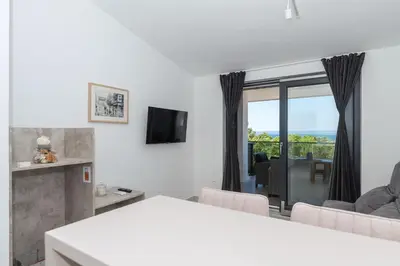 TV i/ili zabavni centar u objektu Apartmani Tona