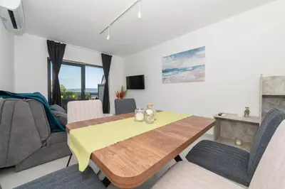 TV i/ili zabavni centar u objektu Apartmani Tona