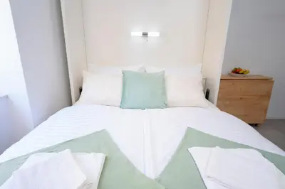 Krevet ili kreveti u jedinici u objektu Clock Tower Apartment - ZF Hvar Center