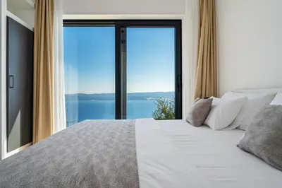 Krevet ili kreveti u jedinici u objektu Villa Mountain Lodge