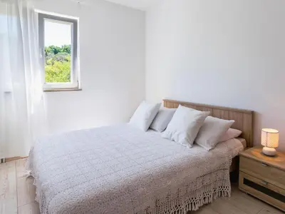 Krevet ili kreveti u jedinici u objektu Apartment Villa 2 Pools-3 by Interhome