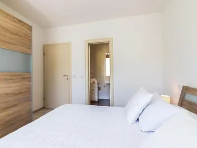 Krevet ili kreveti u jedinici u objektu Apartment Villa 2 Pools-3 by Interhome