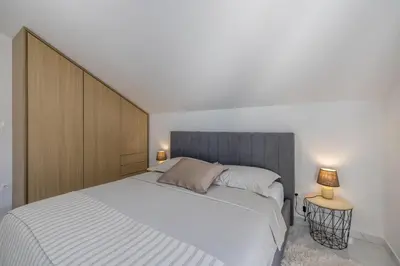 Krevet ili kreveti u jedinici u objektu Modern Sunset Sea View Apartment with Large Terrace - Immortelle