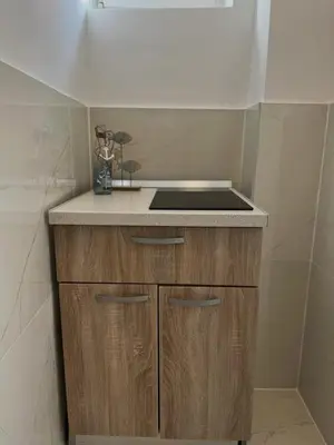 Kuhinja ili čajna kuhinja u objektu Secret Place Apartment