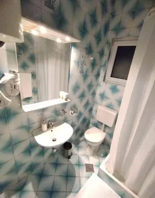 Kupaonica u objektu Apartmani Rudan