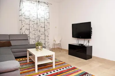 TV i/ili zabavni centar u objektu Apartments Armonia