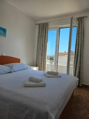 Krevet ili kreveti u jedinici u objektu Apartments Andrijanić