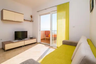 TV i/ili zabavni centar u objektu Apartments Rakuljic