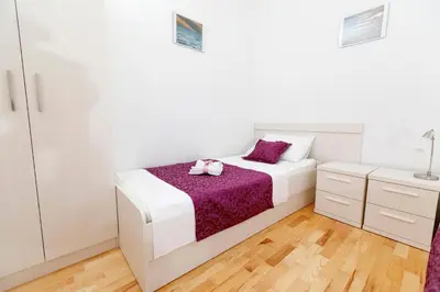 Krevet ili kreveti u jedinici u objektu Apartments Sara & Nina