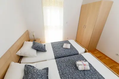 Krevet ili kreveti u jedinici u objektu Apartments Sara & Nina