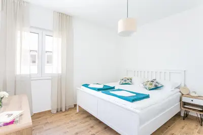 Krevet ili kreveti u jedinici u objektu Apartments by the sea Pisak, Omis - 21568
