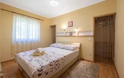 Krevet ili kreveti u jedinici u objektu Lovely Home In Dubrava With Sauna