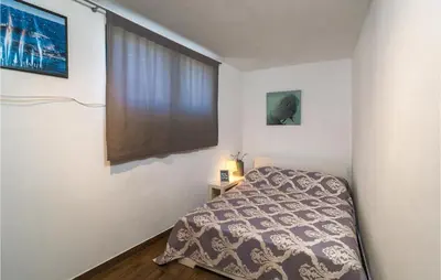 Krevet ili kreveti u jedinici u objektu 3 Bedroom Beautiful Apartment In Mirca