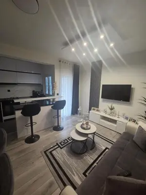 TV i/ili zabavni centar u objektu Apartman Rex