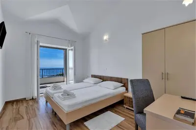 Krevet ili kreveti u jedinici u objektu Villa Magico with pool and fantastic seaview