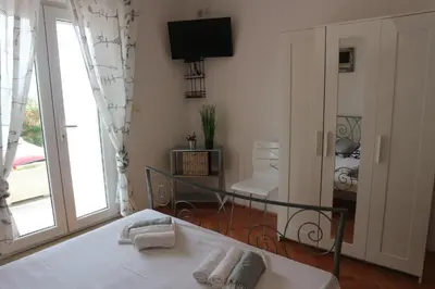 TV i/ili zabavni centar u objektu Apartments Joko