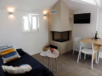 TV i/ili zabavni centar u objektu Apartment Place 2 Stay