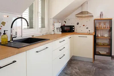 Kuhinja ili čajna kuhinja u objektu Penthouse Vanja